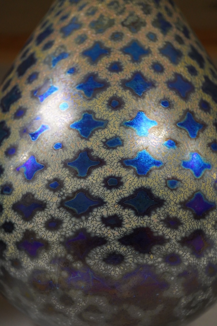 Siddy Langley, a blue iridescent glass vase, 23cm high